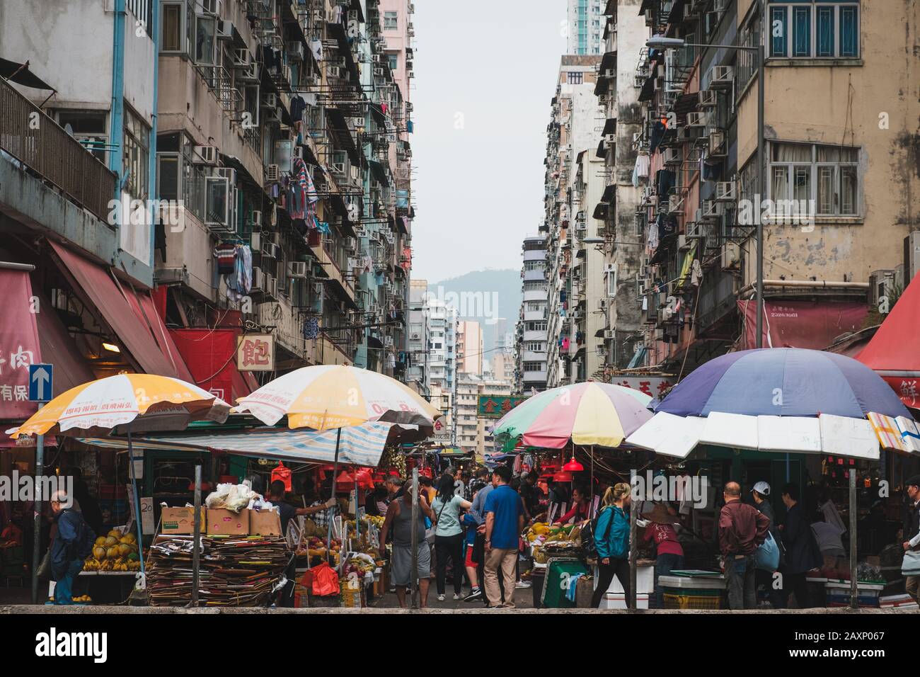 HongKong, China - November, 2019: People on crowded street food market in Hong Kong Stock Photo