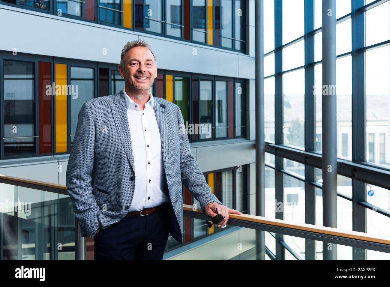 Businessman in modern office building, half portrait Stock Photo