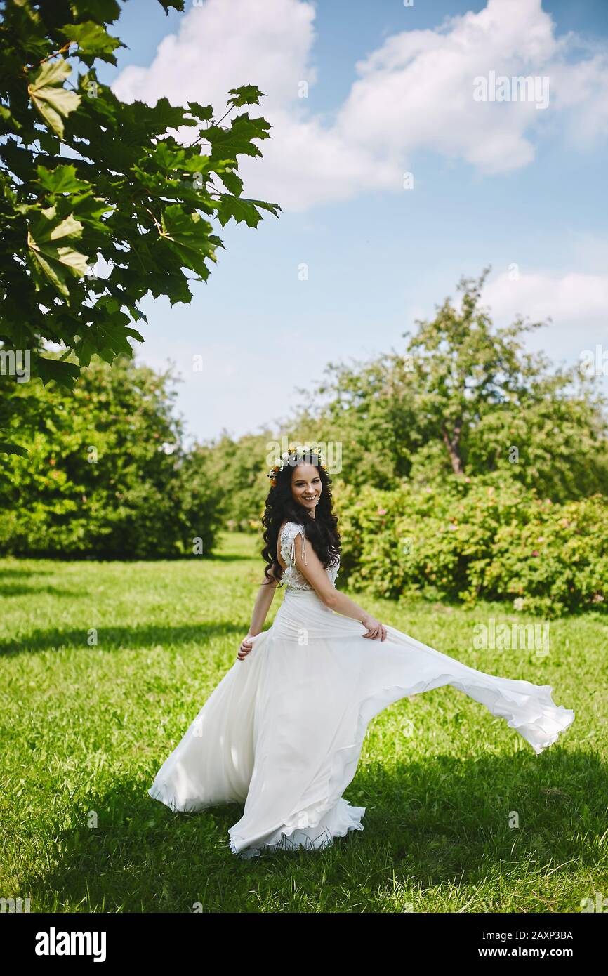 Young bride with floral wreath 