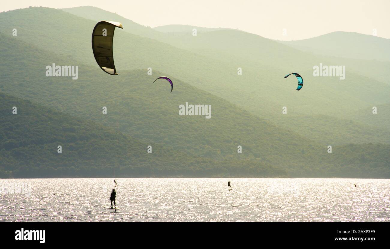 People surf with kite most popular way of extreme water sport this days Stock Photo