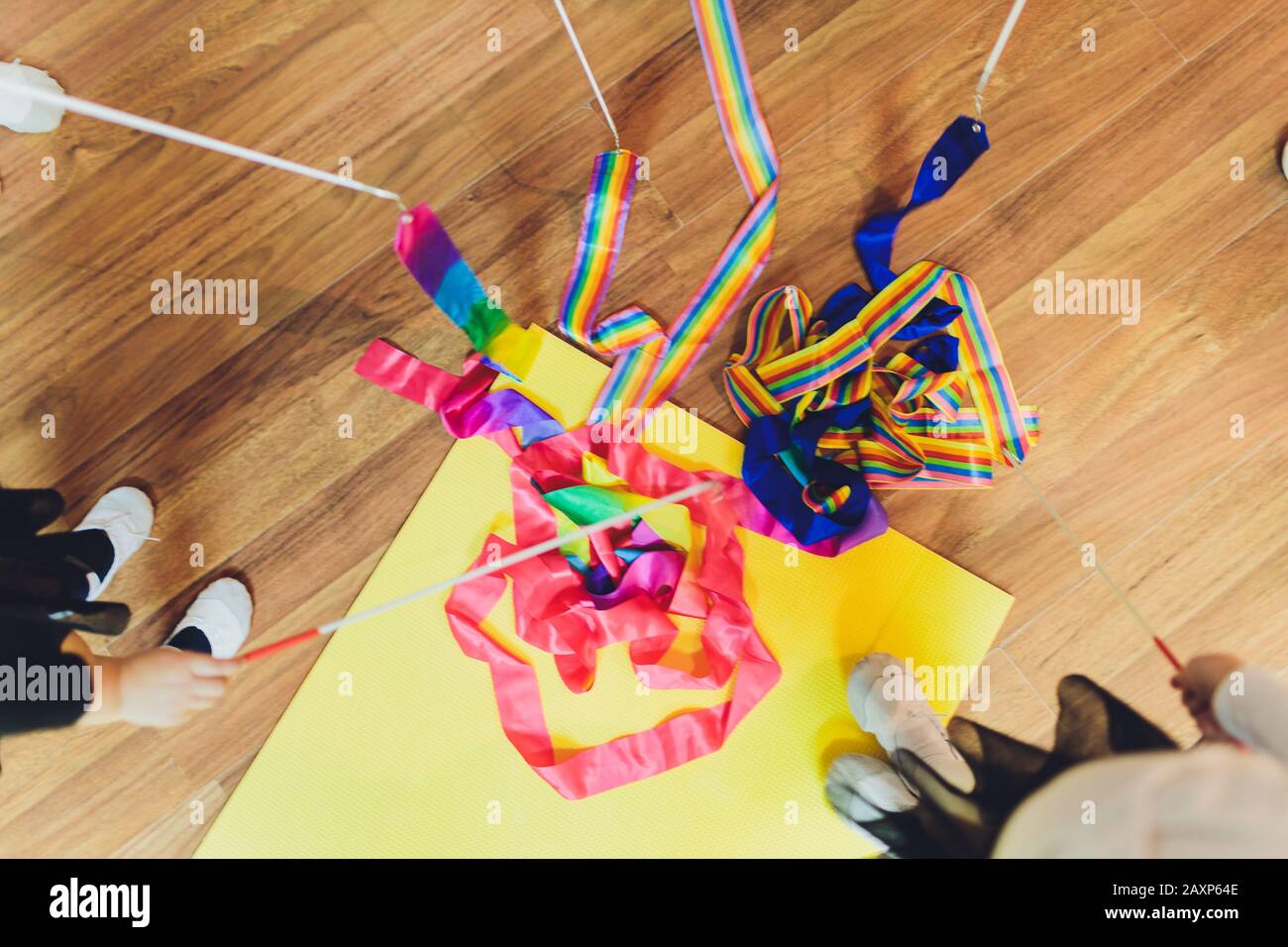 Gymnastics apparatus, ribbon sticks children team. close-up Stock Photo ...