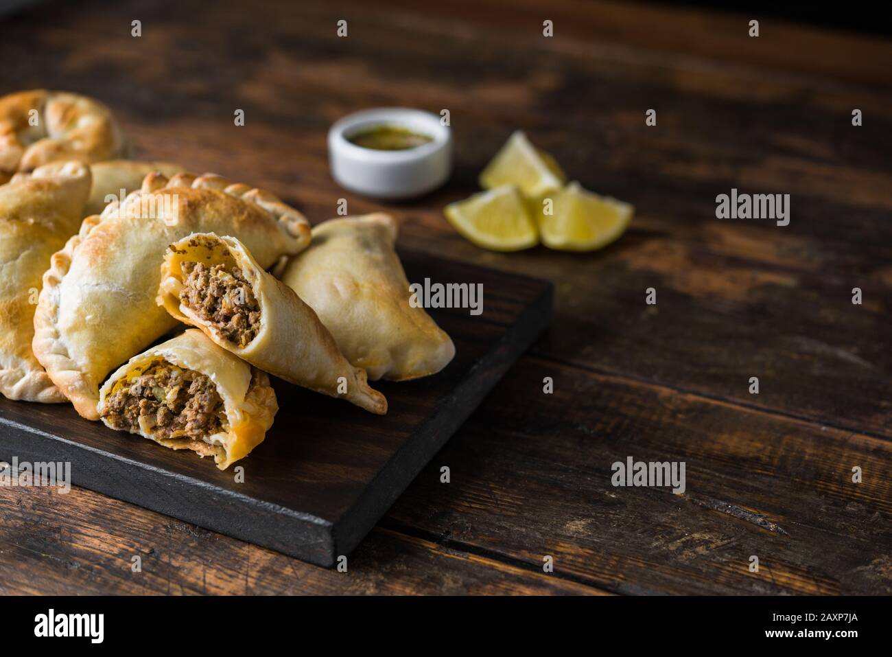 Traditional baked Argentine empanadas savoury pastries with beef