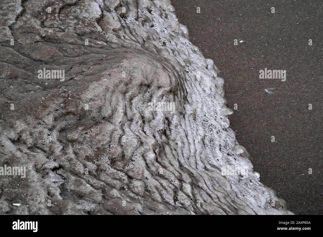 Sand and ice formation at the lake Stock Photo