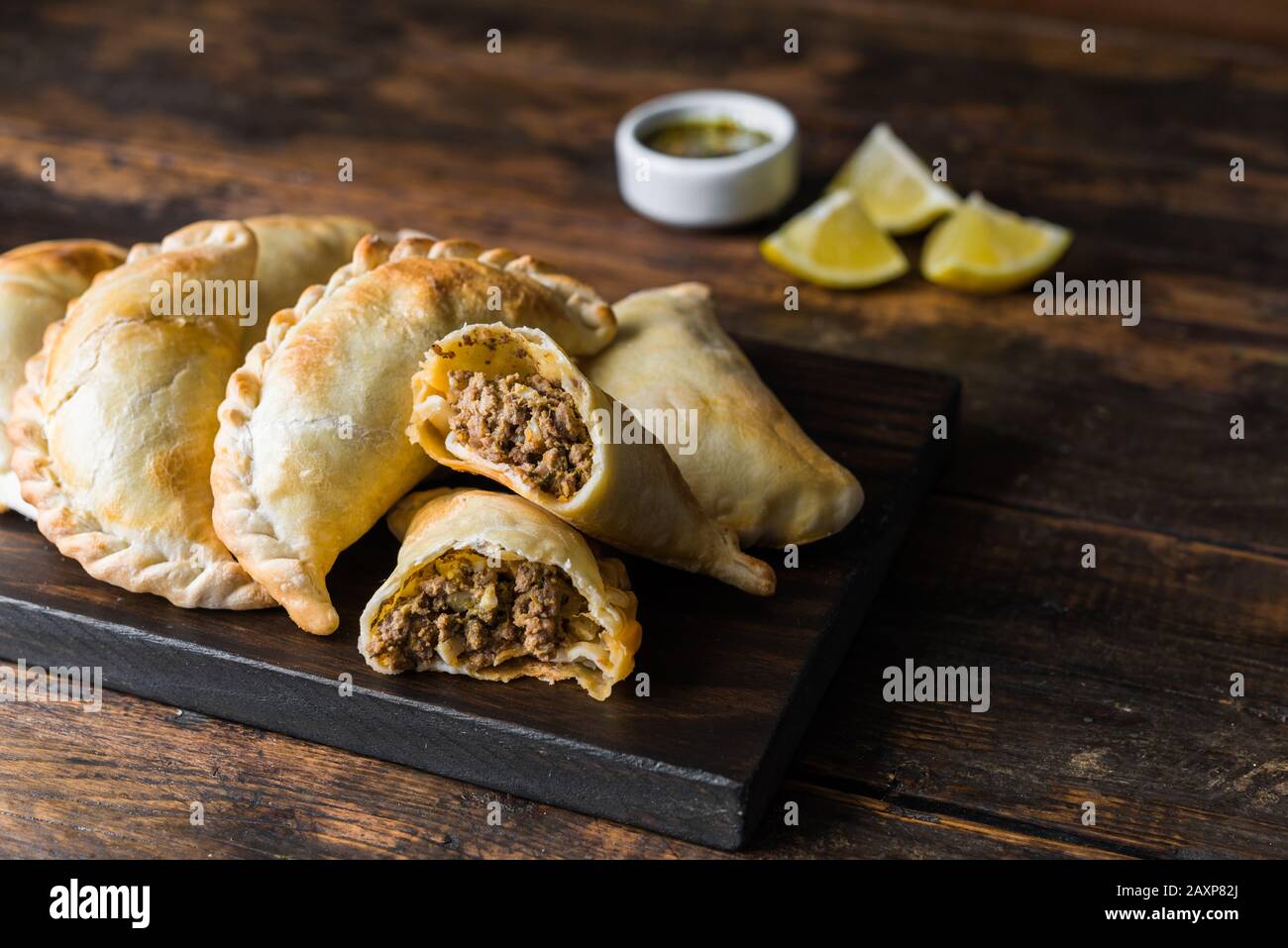 Traditional baked Argentine empanadas savoury pastries with beef