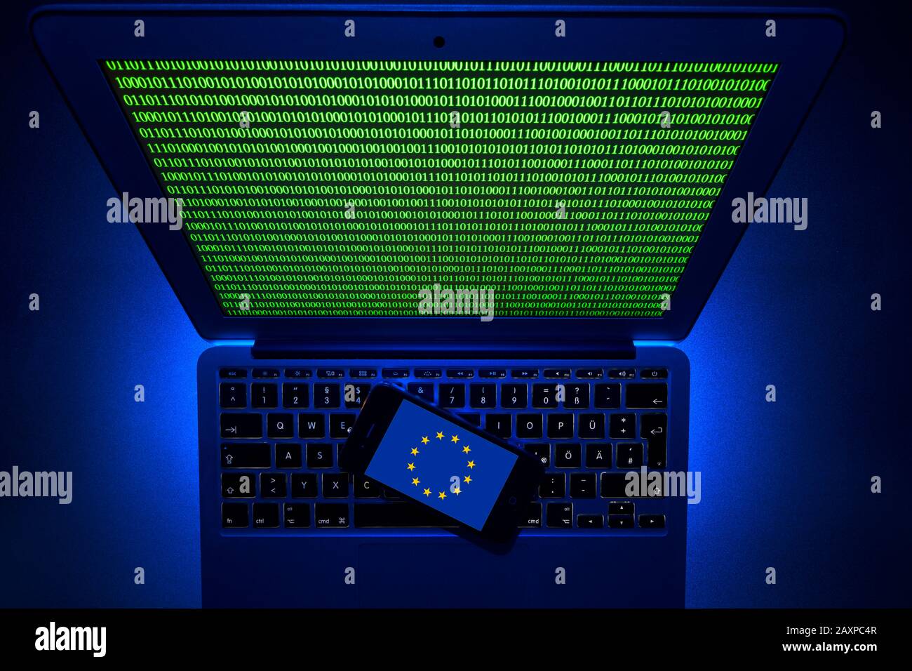 Smartphone with logo of the European flag on computer keyboard, symbol image, Cybercrime, hacker attack on Europe, Stock Photo