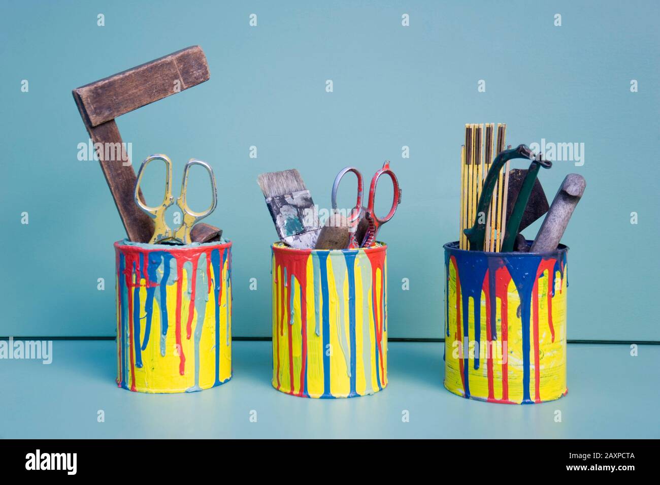 DIY organizing system in old paint cans Stock Photo Alamy