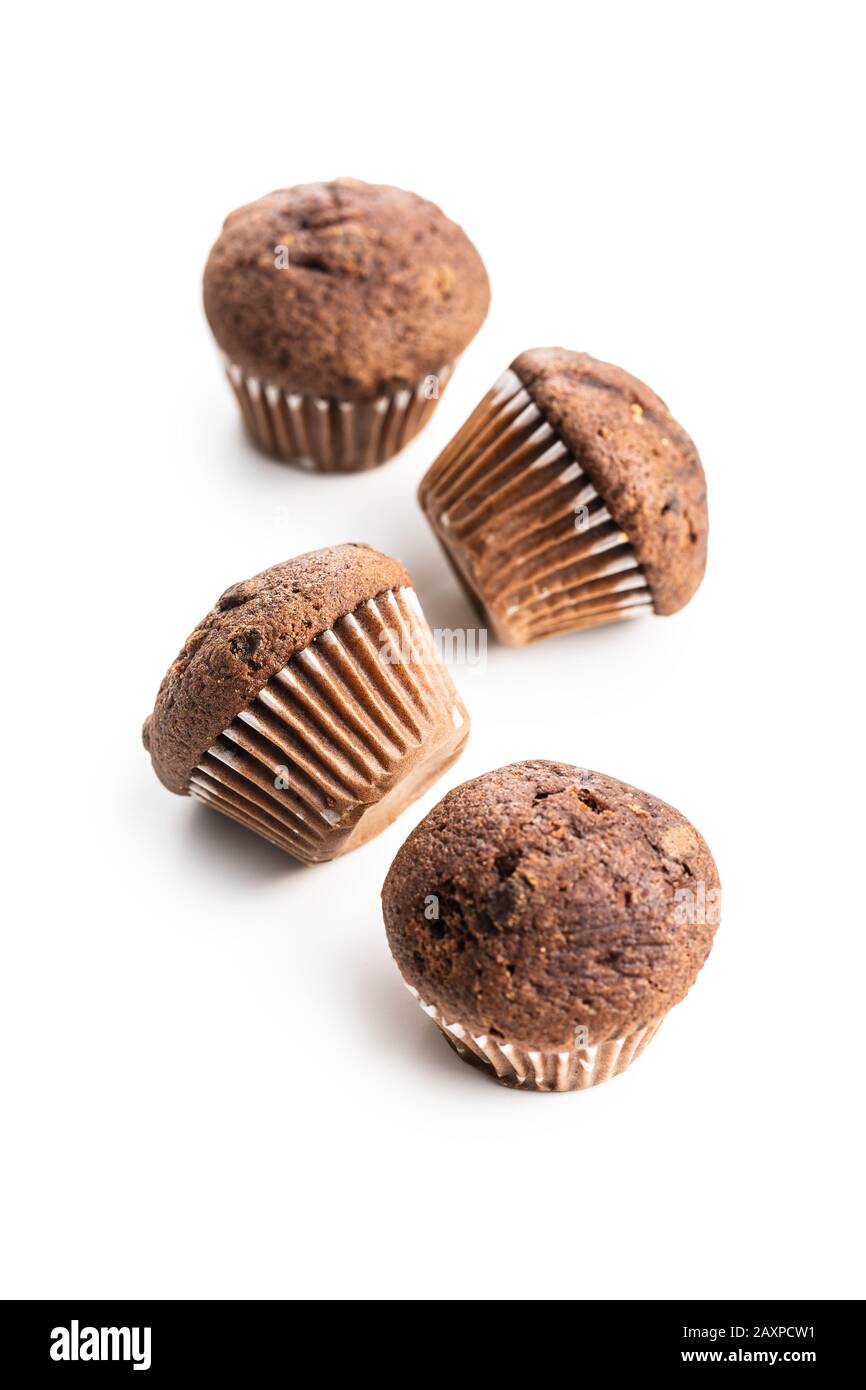 Sweet muffins. Cupcakes with chocolate isolated on white background. Stock Photo