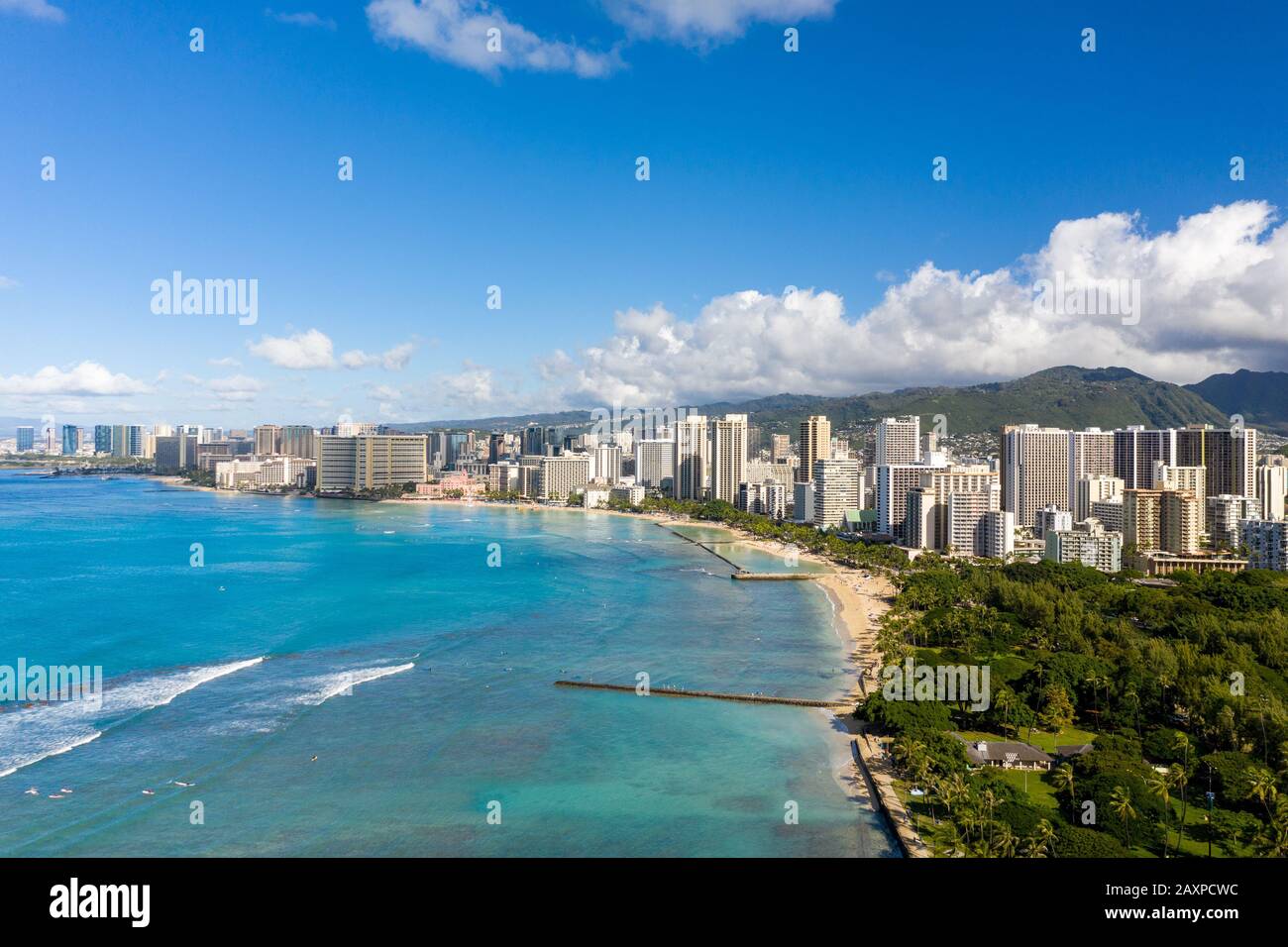 Aerial drone view of the sea front on Waikiki with Honolulu in the background Stock Photo