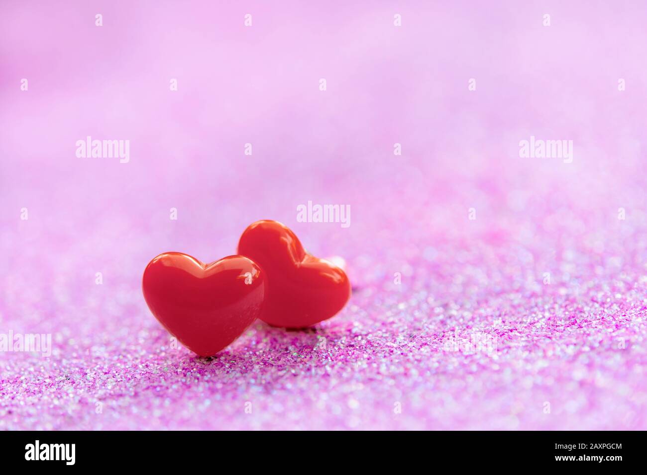 Valentines Day background with Red heart shapes on abstract light pink ...