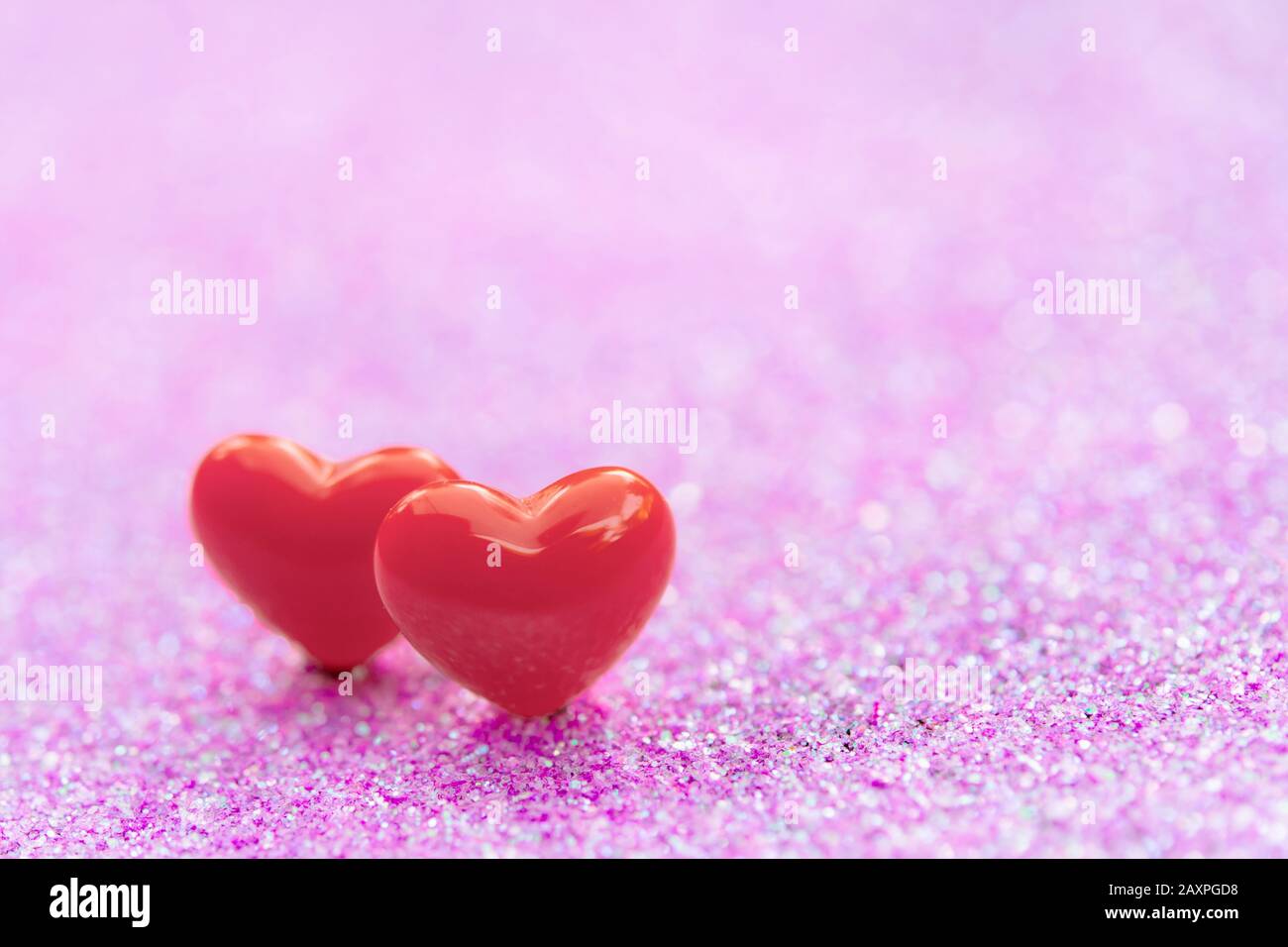 Valentines Day background with Red heart shapes on abstract light pink ...
