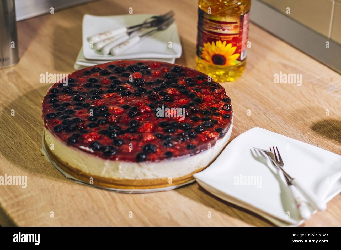 Homemade cheesecake with red fruits topping Stock Photo