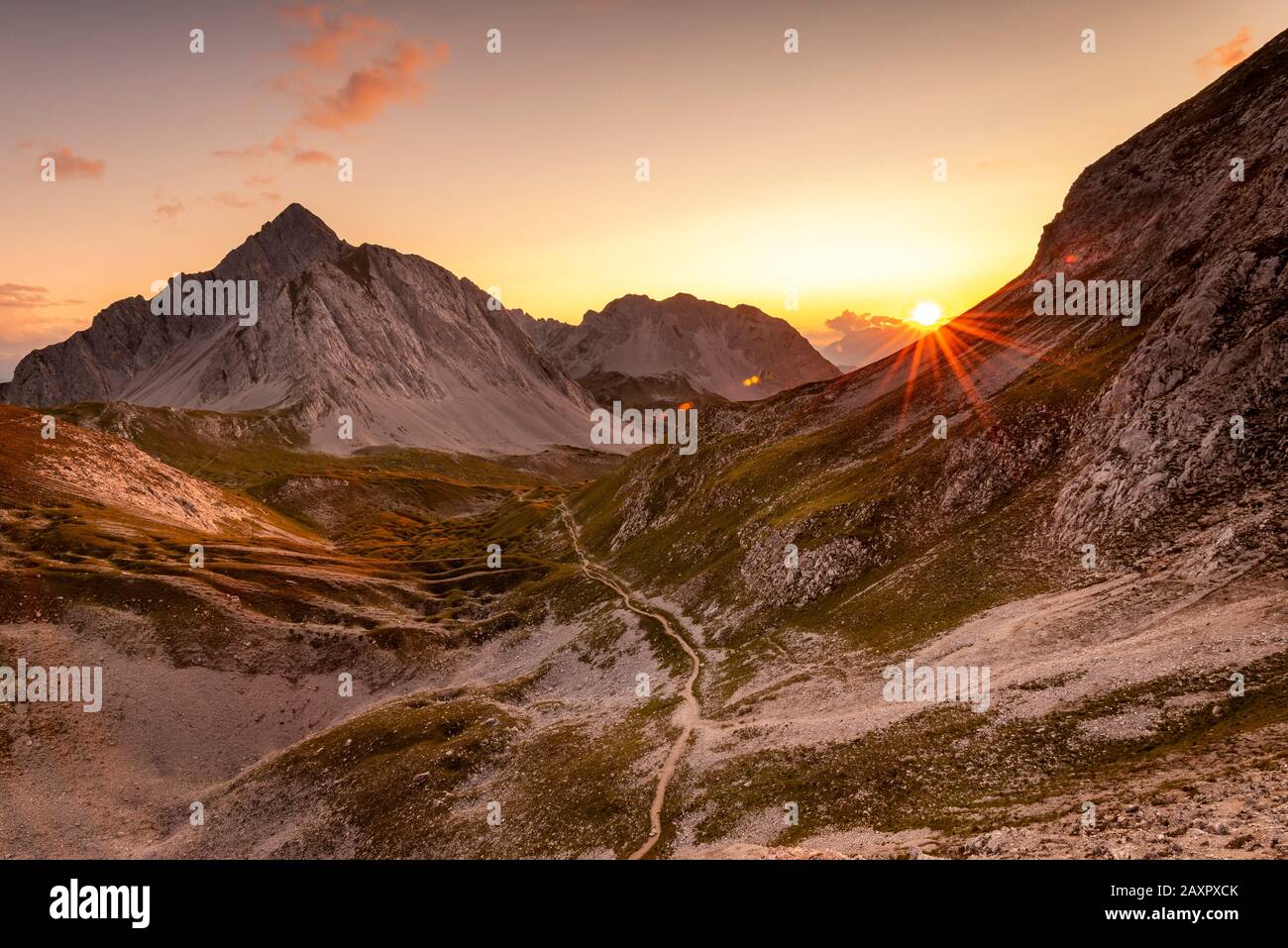 Sunset in the northern Karwendel range above the Pfeisalm, view to the Rumer Spitze (2454m) Stock Photo