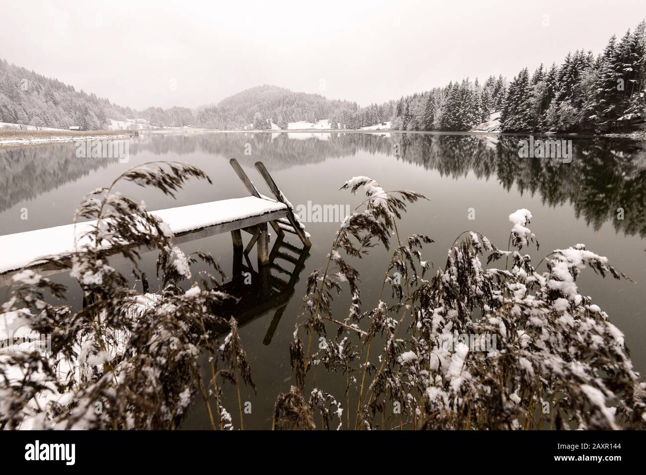The jetty at Geroldsee with snow in winter Stock Photo