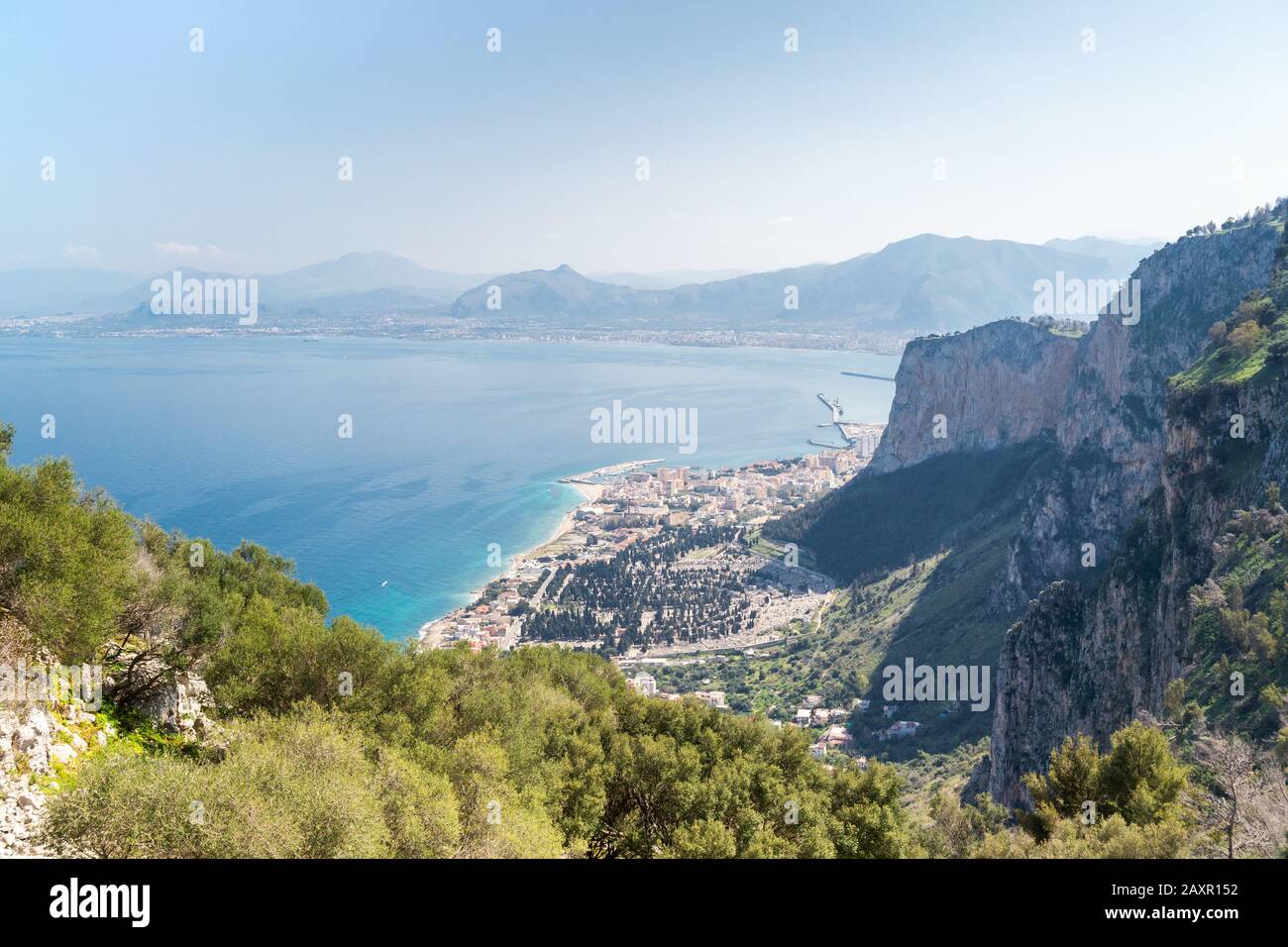 Panoramic view on the sea with cityscape from statue of Santa Rosalia on Monte Pellegrino on a beautiful sunny day in Palermo, Sicily. Stock Photo