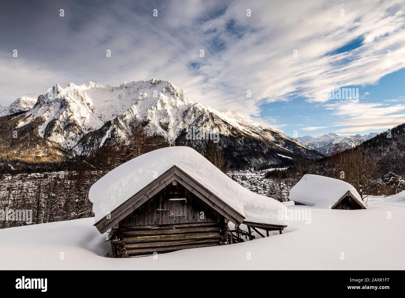 Haystack on the so-called 'coffee field' above Mittenwald with a view of the western Karwendel and the place. Stock Photo