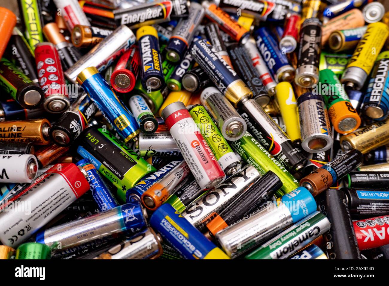 A pile of batteries of different brands Stock Photo Alamy