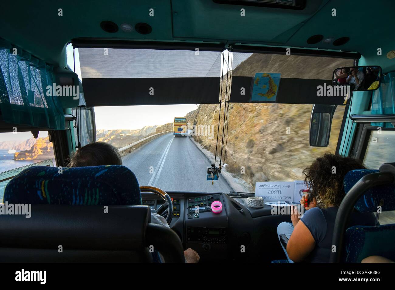 The view from inside a tour bus along the winding hillside road from