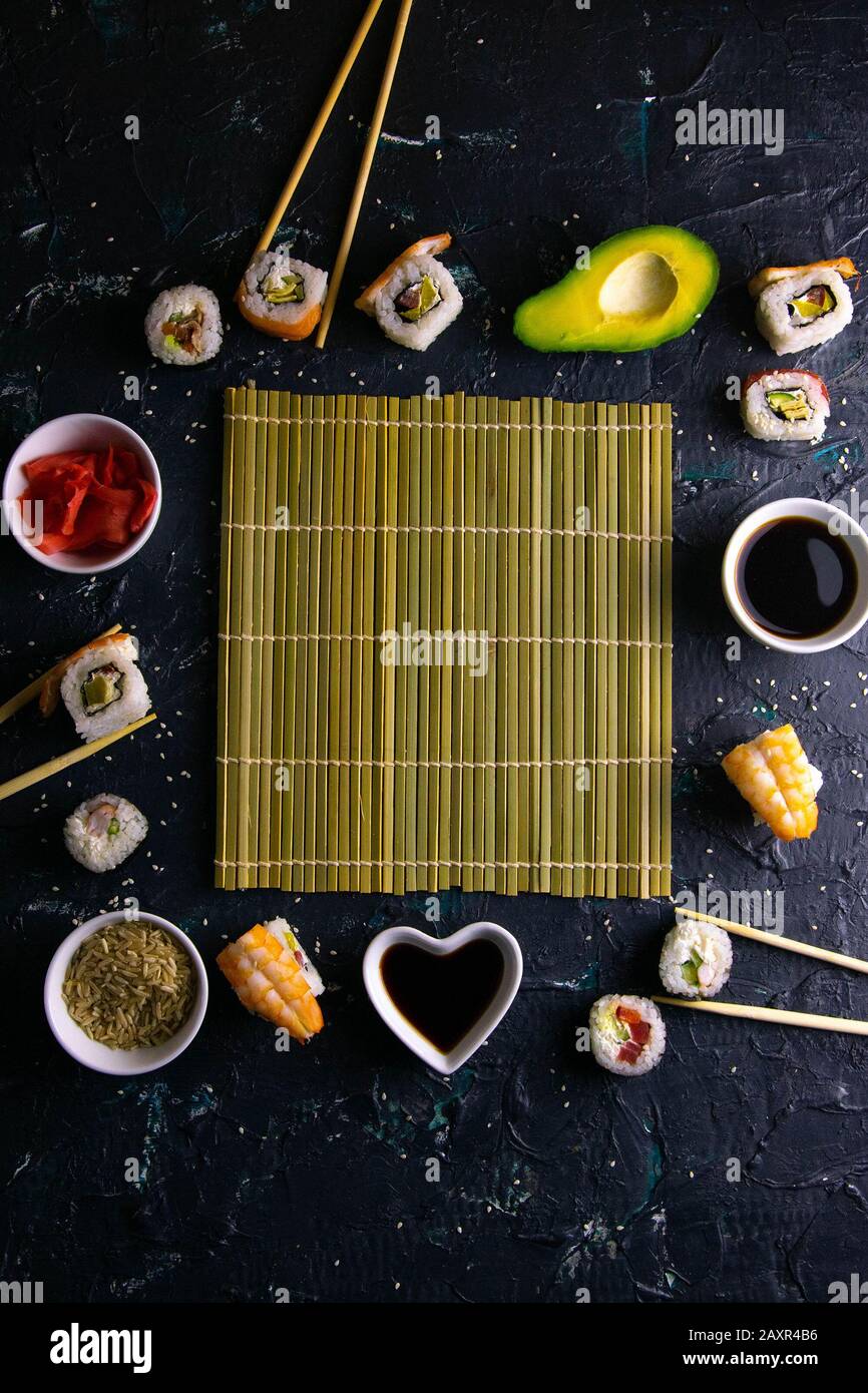 Different roles, avocado, red marinated ginger, rice, soy sauce are