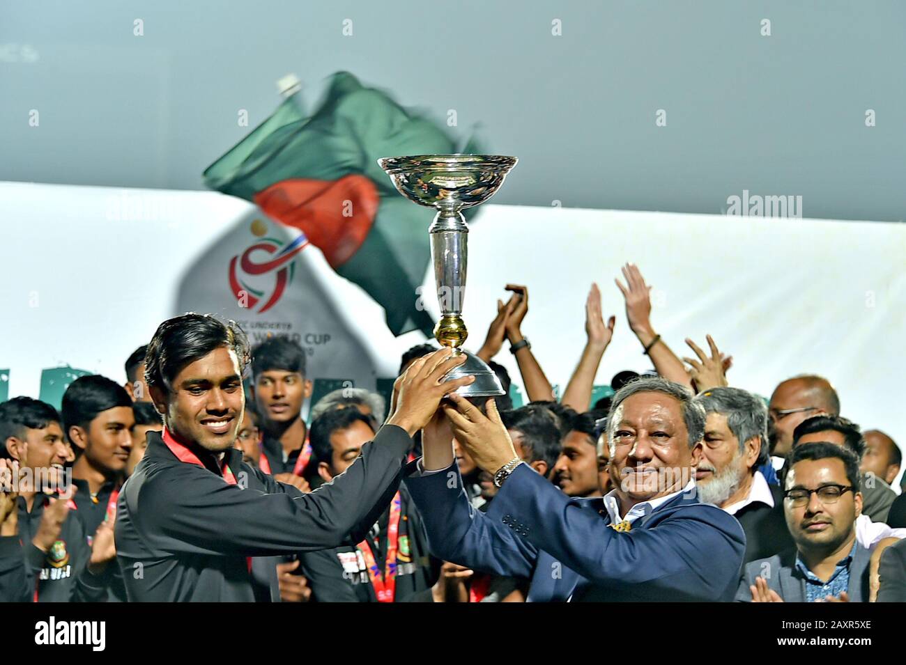 Dhaka, Bangladesh. 12th Feb, 2020. Bangladeshs ICC Under-19 World Cup winning squad and officials pose for pictures with trophy upon arrival in Dhaka, Bangladesh, on Feb