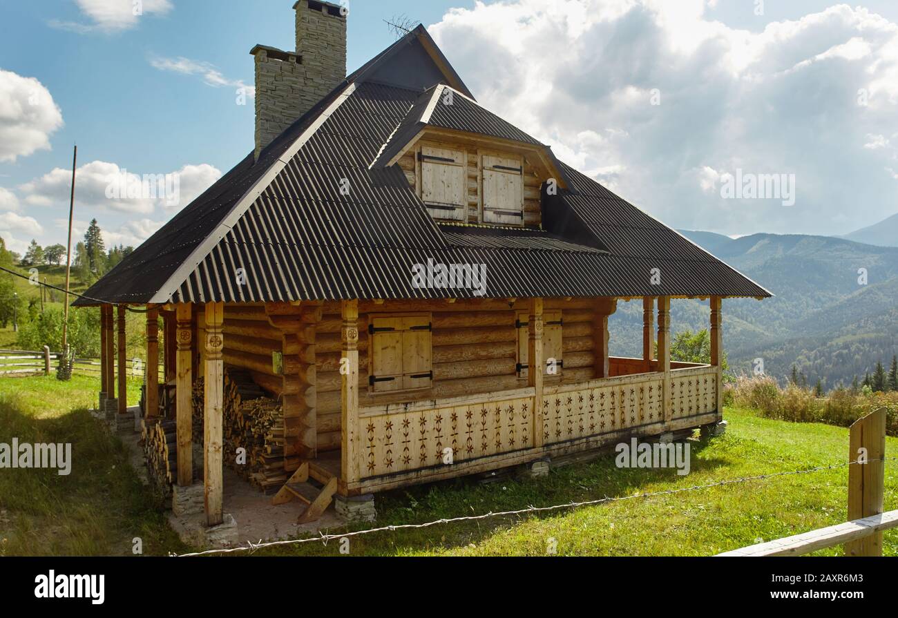 wooden Hutsul-style house in Dzembronya village in Ukrainian Carpathians Stock Photo