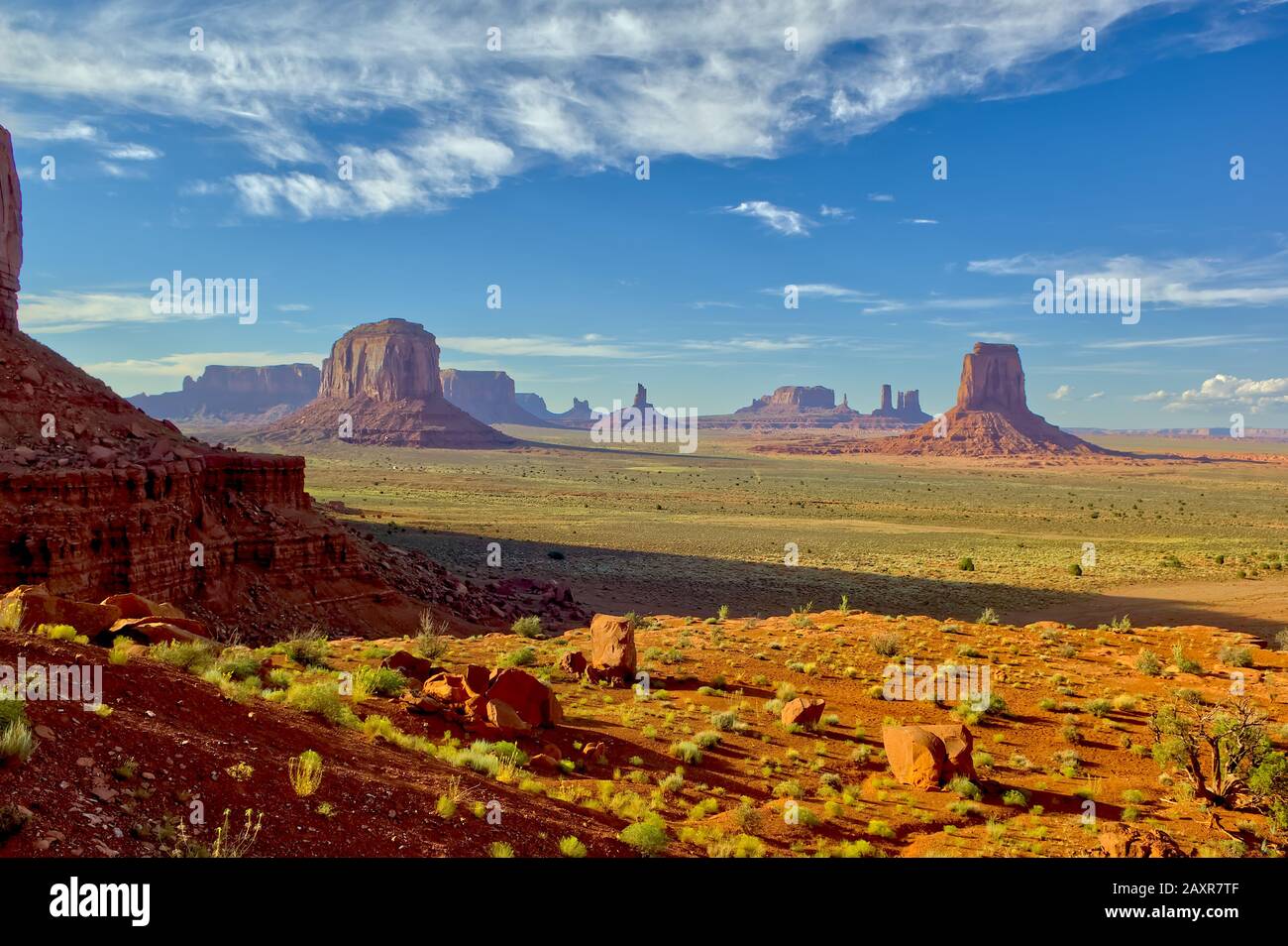 A view of Monument Valley Arizona from a location called the North Window. This valley resides on the Navajo Indian Reservation. Stock Photo