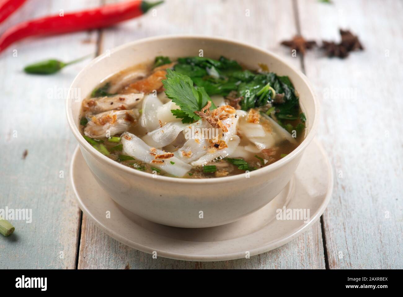 keow teow sup or ladna flat noodles soup in traditional malay style Stock Photo