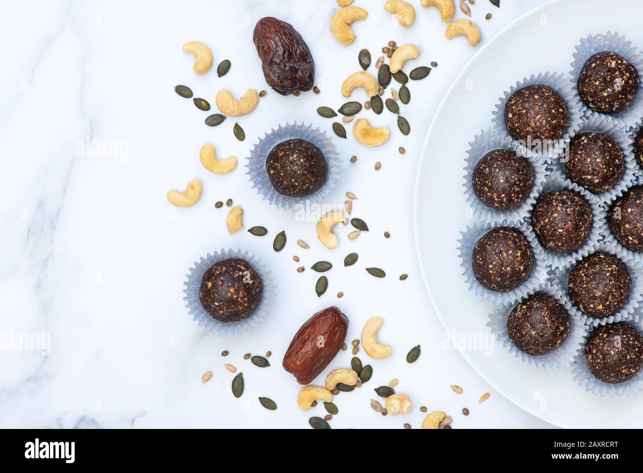 Homemade vegan cacao date seeds and nut energy balls. Made with medjool