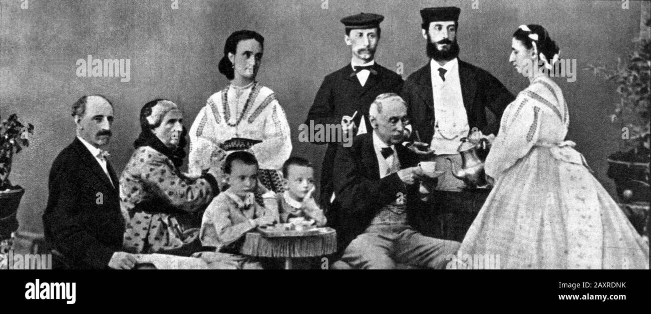 1868, ROMA , ITALY :  The italian family of Princes ORSINI  while they take a hot chocolate at home. In this photo prince Domenico ORSINI (1790 - 1874) Duca di Gravina principe di Solofra e di Roccagorga with wife Maria Luisa TORLONIA (1804-1883) dei Duchi di Poli e Guadagnolo . The daughter Giacinta Orsini (1825-1886) married with Conte Augusto de' Gori Pannilini (1820-1877), marchese URBANO SACCHETTI di Castelromano (1835-1912) (the man with moustache, standing 2nd from the right) with wife BEATRICE ORSINI (1837-1902),  FILIPPO ORSINI (1842-1924) Duca di Gravina with wife Giulia contessa HOY Stock Photo