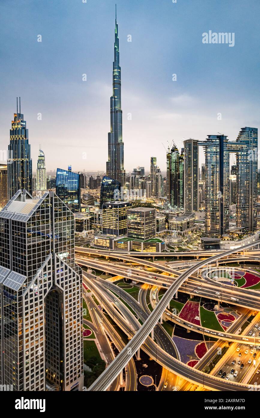 A shot of Dubai city showing Sheikh Zayed Road intersection and Burj Khalifa Stock Photo