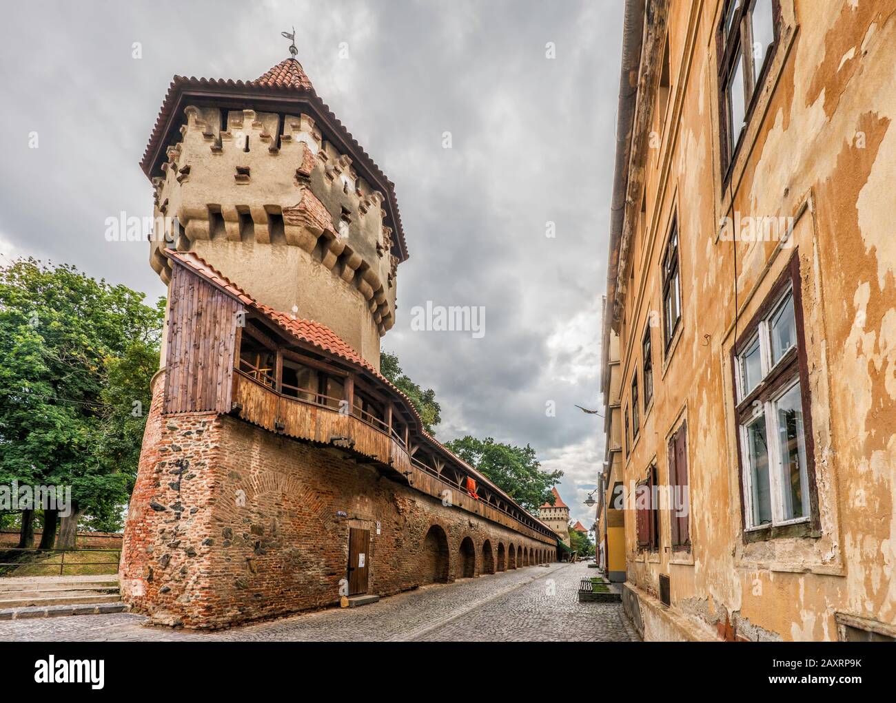 Medieval Carpenters Tower (Turnul Dulgherirol) and city wall with gallery, Strada Cetatii in Sibiu, Transylvania, Romania Stock Photo