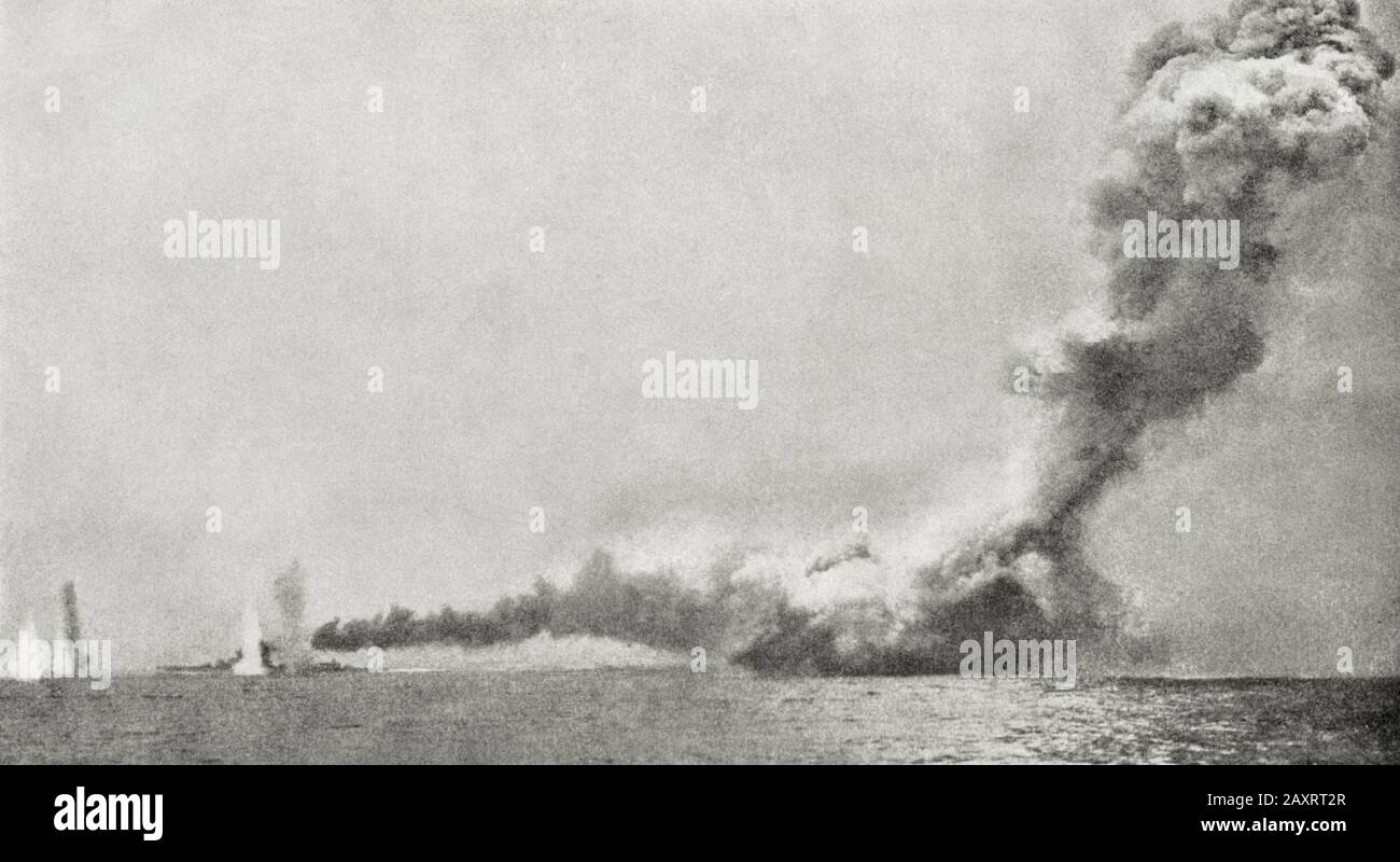HMS Queen Mary blowing up after taking a hit to the citadel during the Battle of Jutland with HMS Lion beside her, 1916 Stock Photo