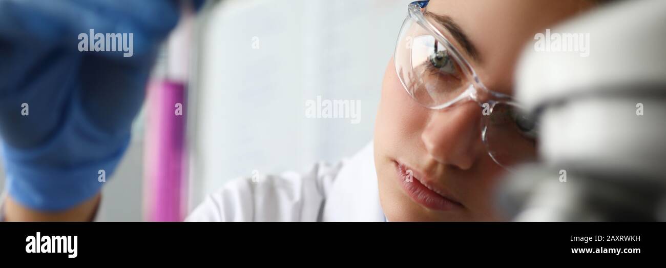 Focused lab worker involved in testing process Stock Photo - Alamy