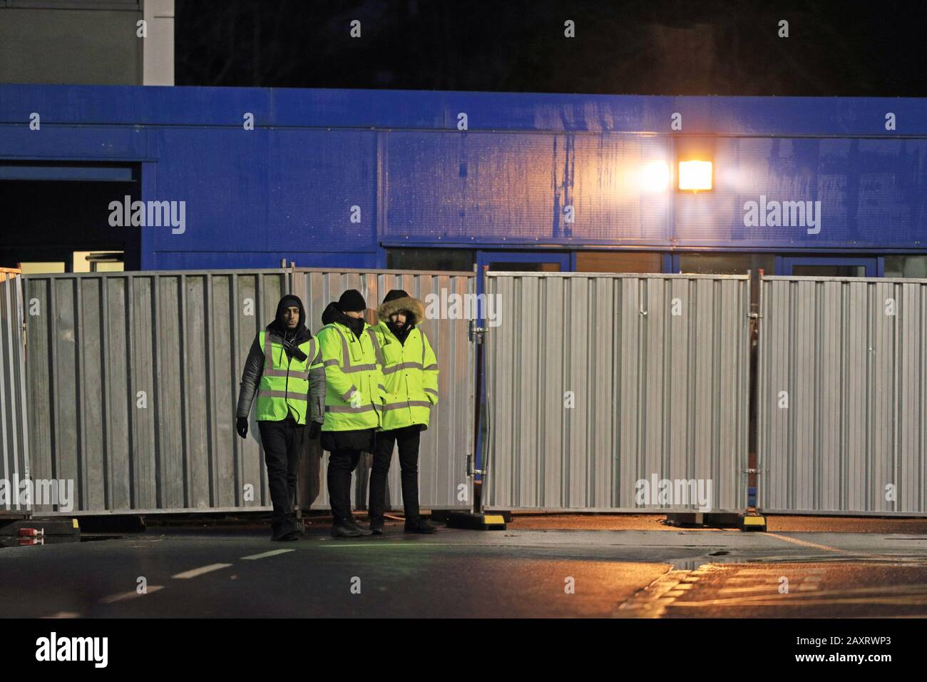 Staff in high-visibility jackets at the facility at Arrowe Park Hospital on Merseyside, from where British nationals, who were repatriated by the UK Government from the coronavirus-hit city of Wuhan in China, are expected to leave later Thursday after spending two weeks in quarantine. Stock Photo