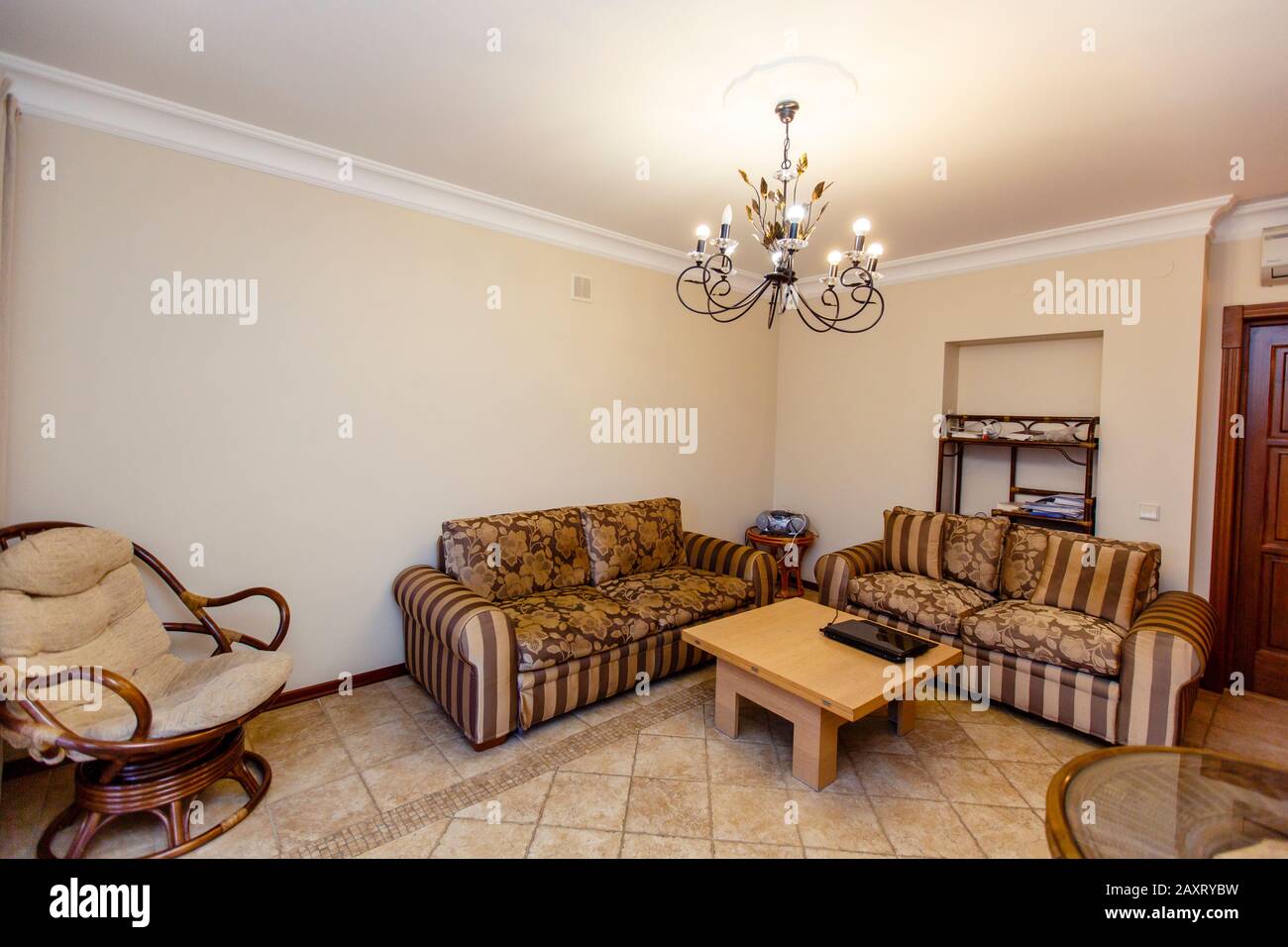 Elegant Beige Sofa In A Dark Navy Blue Living Room Interior With Black Furniture And Stylish Decor Stock Photo Alamy
