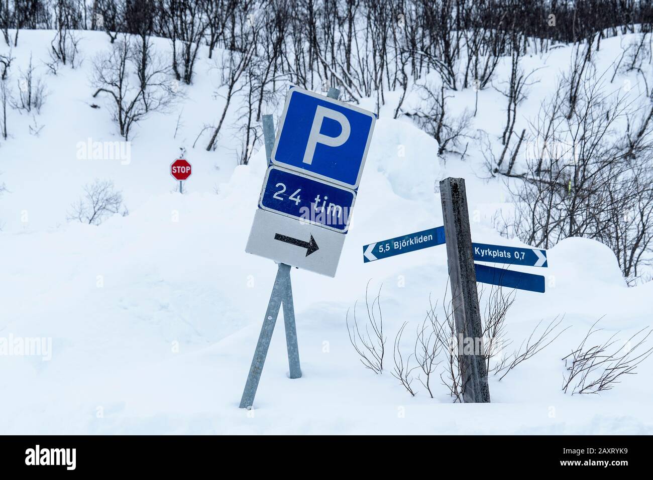 Sweden, near Abisko, snowy parking, signs, signpost Stock Photo Alamy