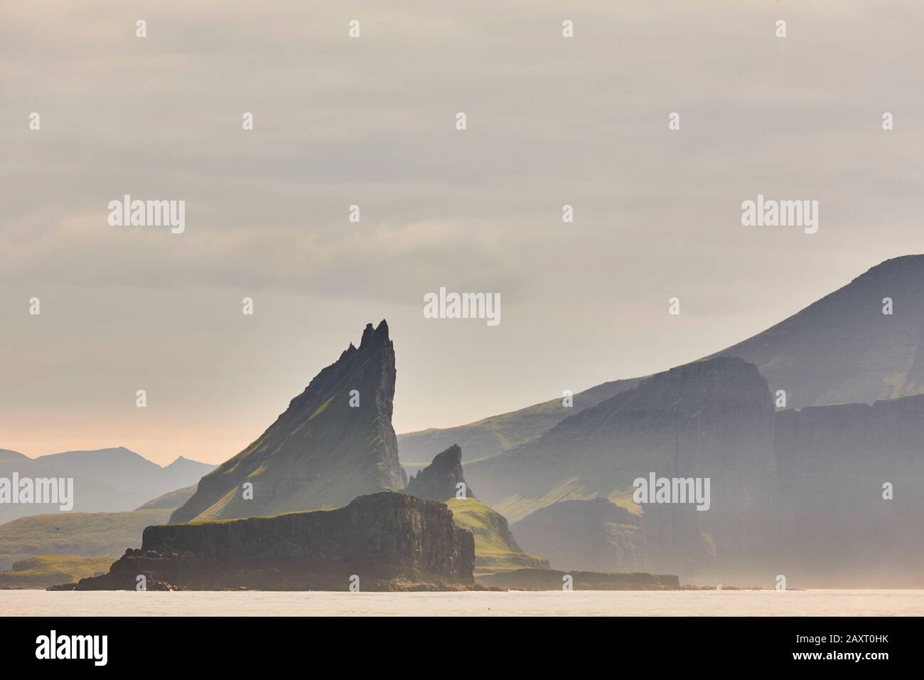 Faroe islands sunset dramatic coastline landscape in Vagar island ...