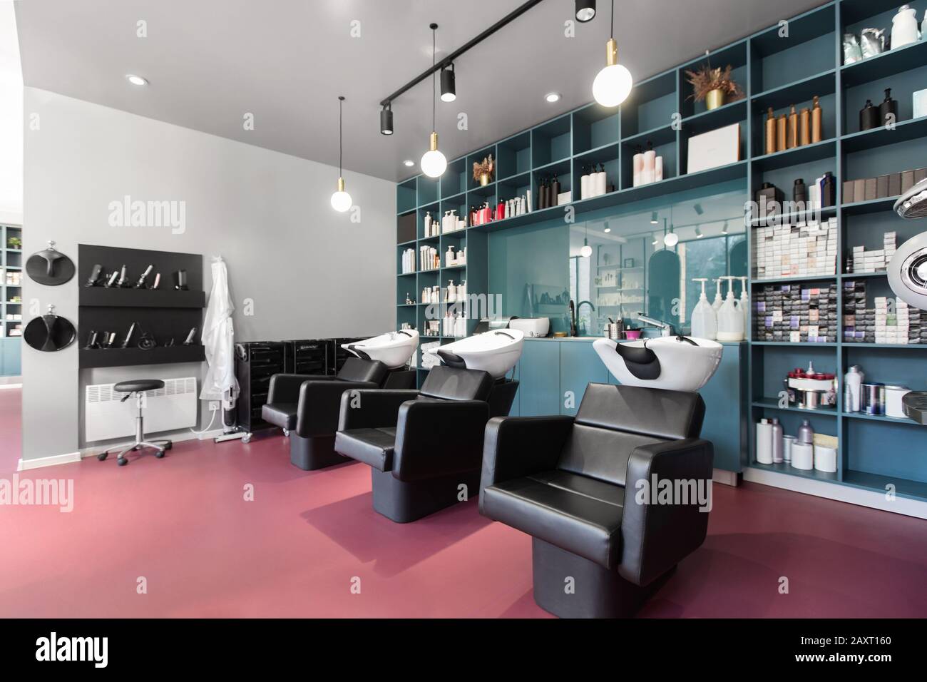 Bright interior of a beauty salon with armchairs for hairdresser procedures...