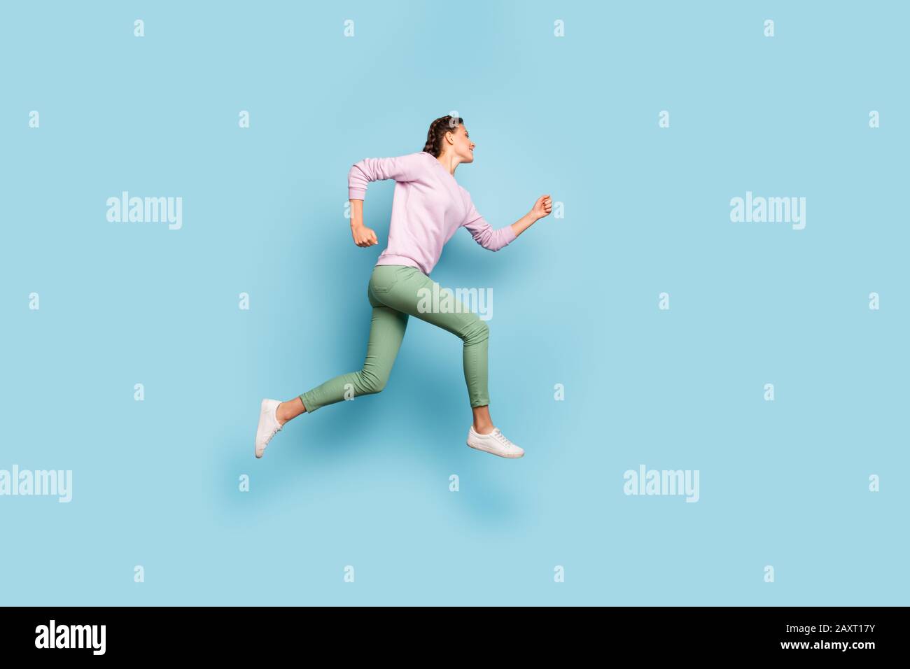 Full length photo of beautiful lady jumping high up rushing finish line ...