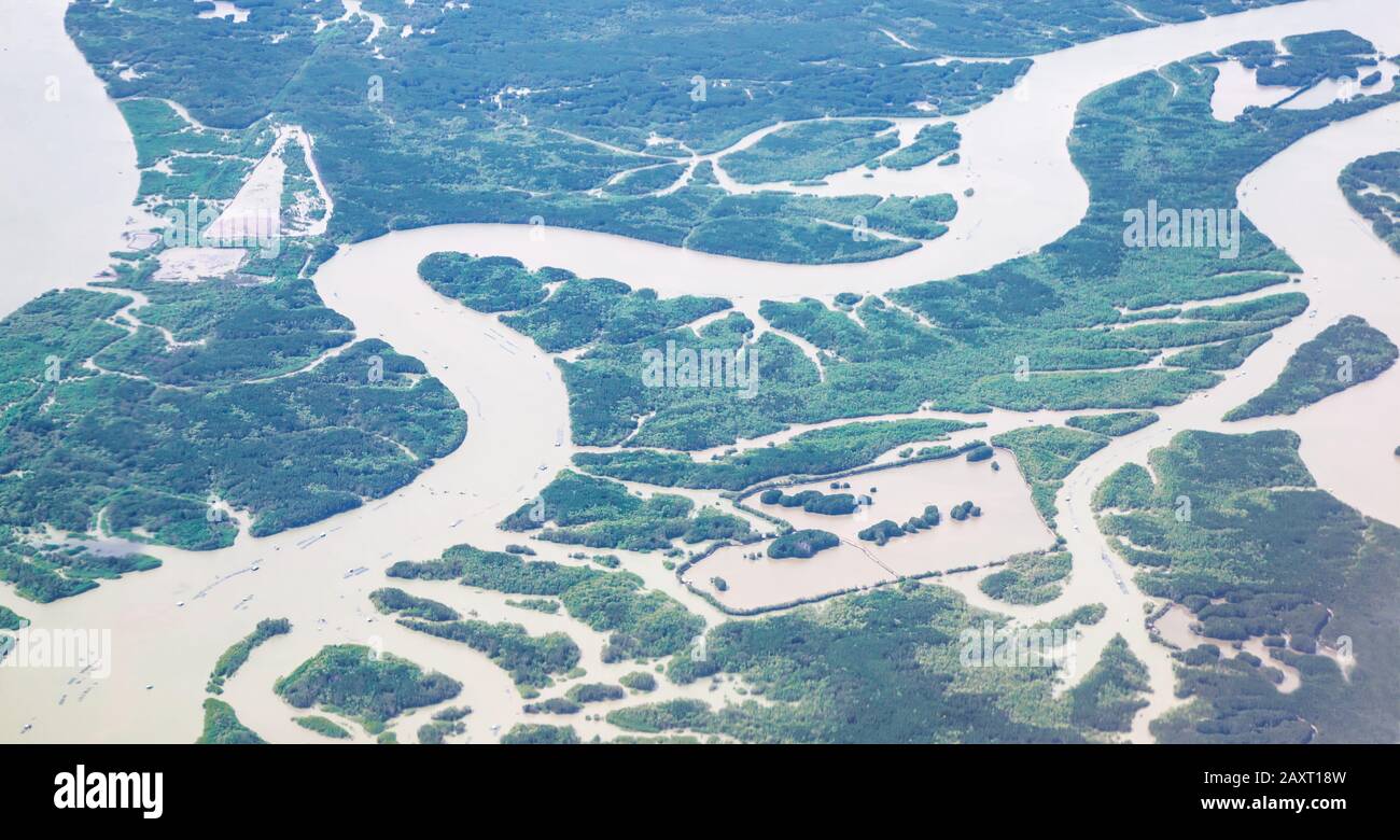 korn Kan ikke lide boliger Bird eye view from plane window: Ho Chi Minh City with meandering Saigon  River at dusk on a rainy day. Geology, Landscape, Forest Conservation,  Nature Stock Photo - Alamy