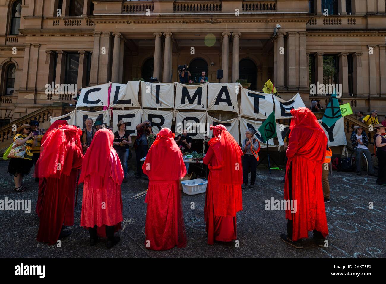 Sydney, Australia - October 8, 2019 - Red Rebels joined hundreds of Australian Extinction Rebellion activists in a Sydney climate change protest rally. Stock Photo