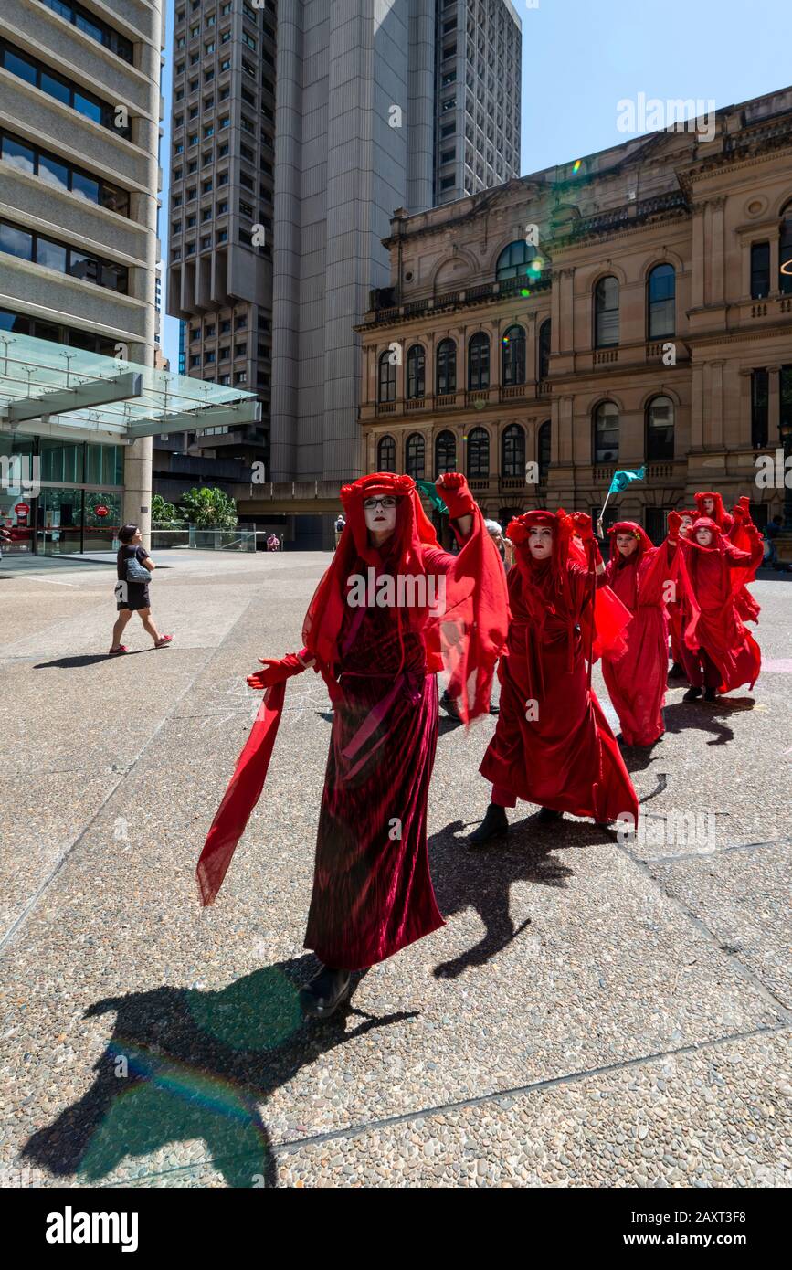Sydney, Australia - October 8, 2019 - Red Rebels joined hundreds of Australian Extinction Rebellion activists in a Sydney climate change protest rally. Stock Photo