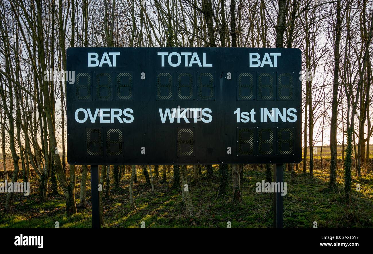 Cricket scoreboard at village country cricket club, England Stock Photo