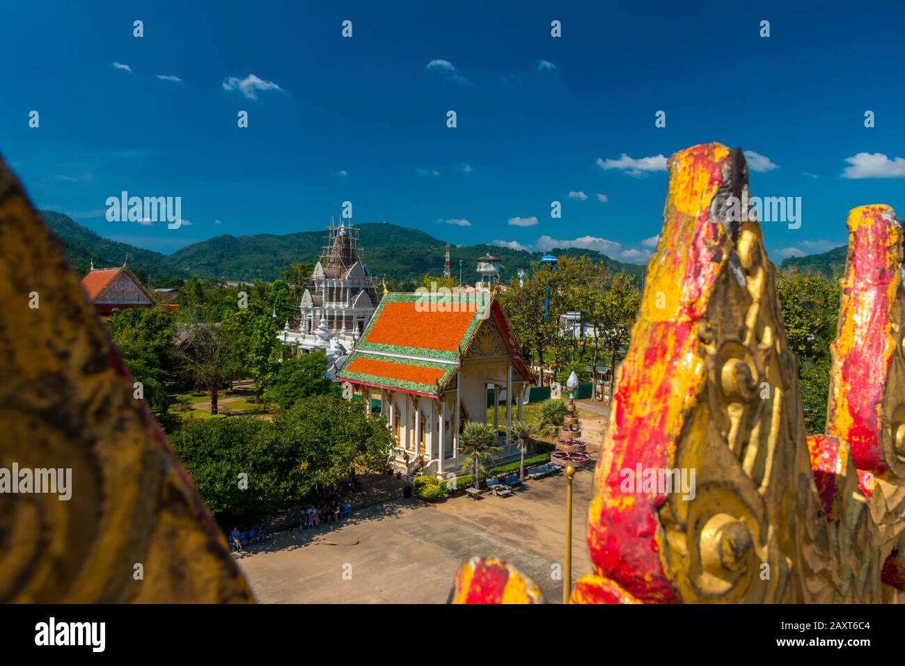 Wat Chalong,Phuket/Thailand-15December2019: view on a pagoda at the historical landmark and Buddhist temple with blue sky and sunny day Stock Photo