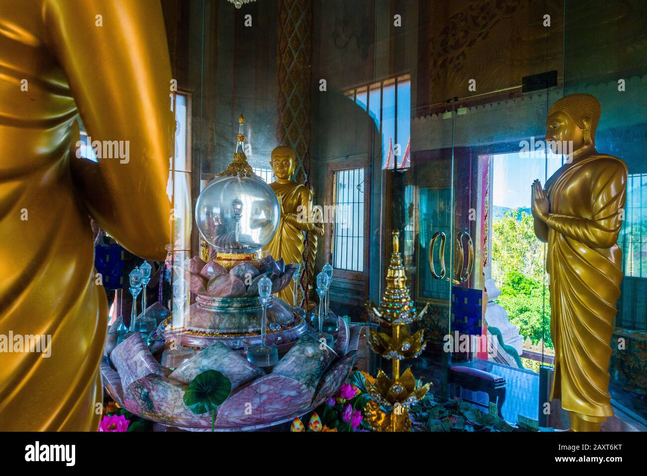Wat Chalong,Phuket/Thailand-15December2019: Shot of the shrine in glass,containg bone splinter of Buddha, inside the top floor of the grand pagoda Stock Photo
