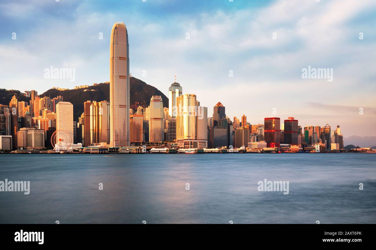 Hong Kong skyline at sunrise from kowloon side, Victoria harbour Stock Photo