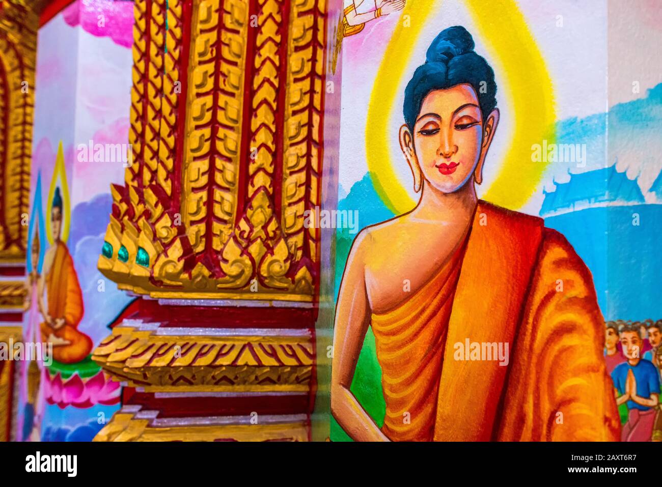 Wat Chalong,Phuket/Thailand-15December2019: Detail shot of a colorful religious wall painting of lord buddha inside the grand pagoda. Stock Photo