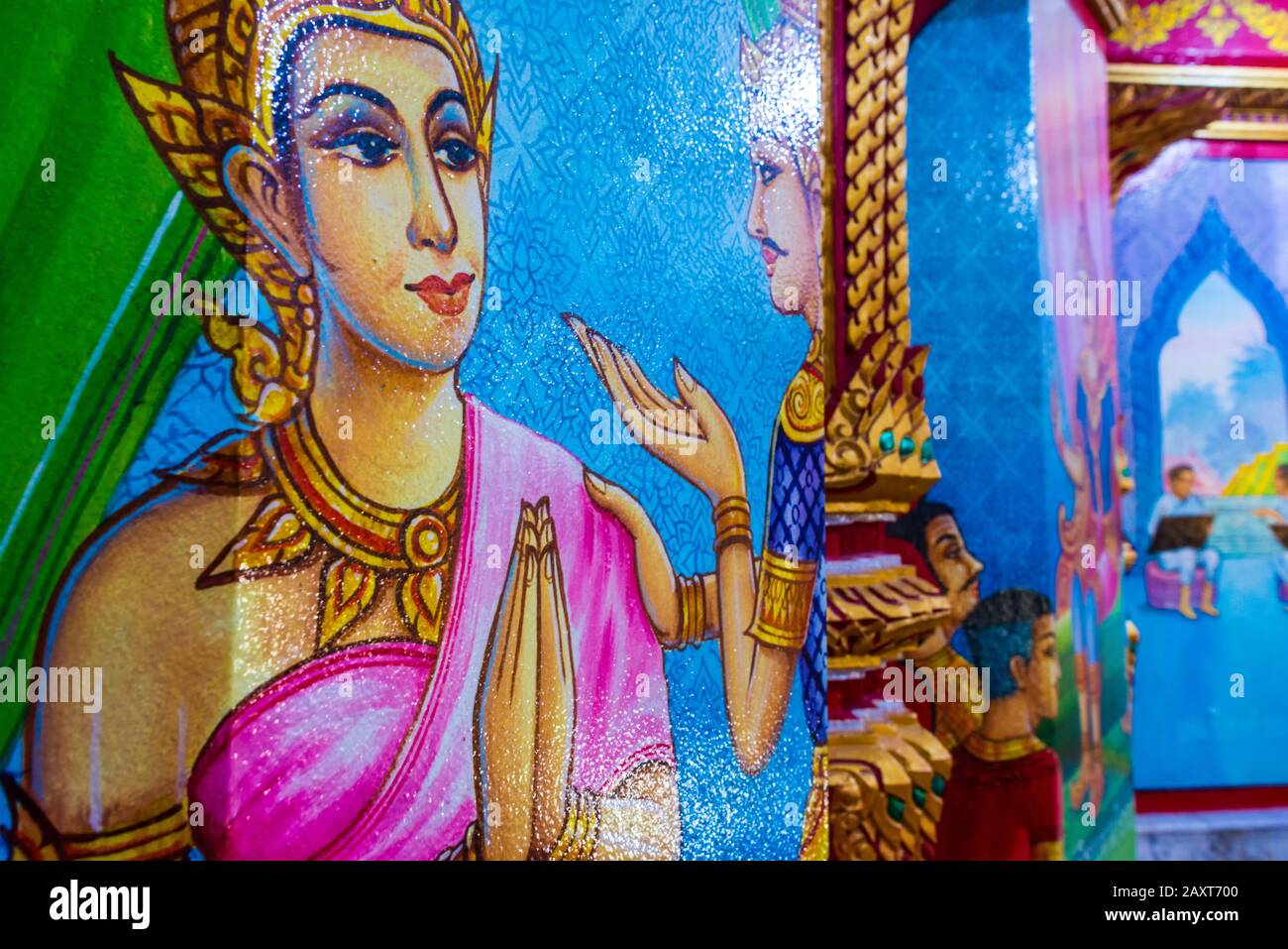 Wat Chalong,Phuket/Thailand-15December2019: Detail shot of a colorful religious wall painting of lord buddha inside the grand pagoda. Stock Photo