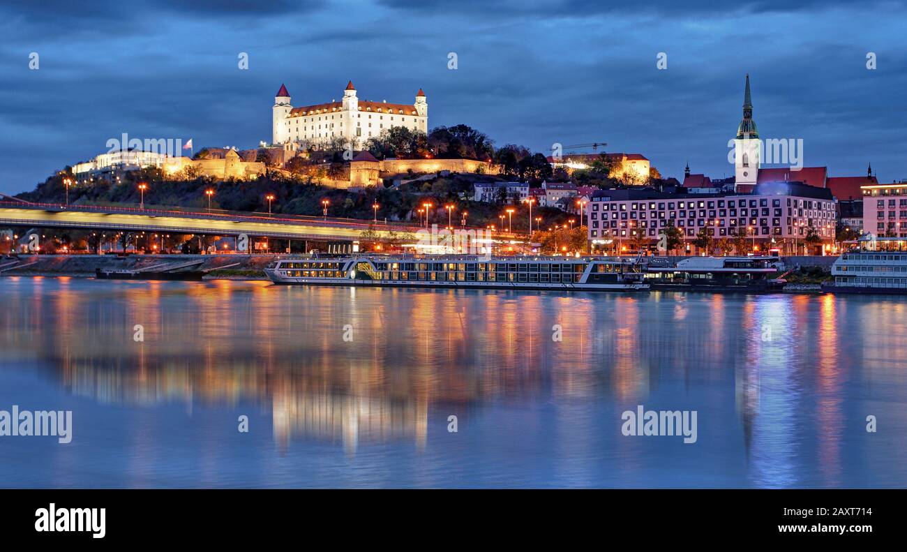 Bratislava skyline at night with castle, Slovakia Stock Photo