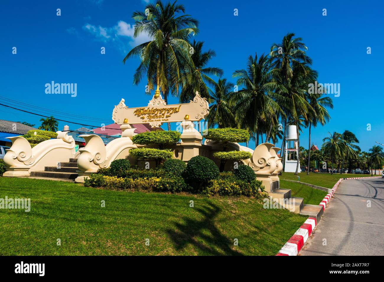 Wat Chalong,Phuket/Thailand-15December2019: view on a pagoda at the historical landmark and Buddhist temple with blue sky and sunny day Stock Photo