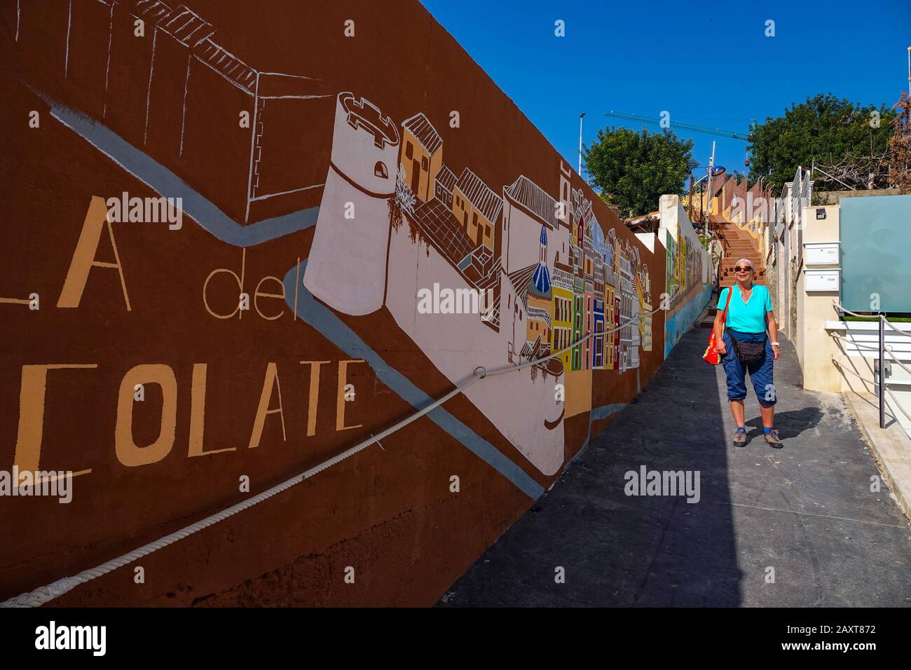 City of chocolate painted mural on a wall at the popular tourist destination of Villajoyosa, Costa Blanca, Spain Stock Photo